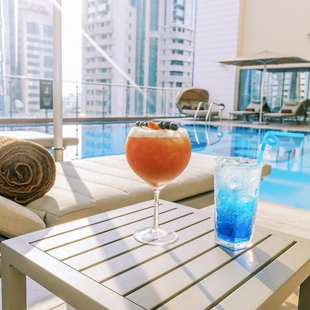 Khalidia Palace Hotel Dubai By Mourouj Gloria Екстериор снимка The pool at the hotel