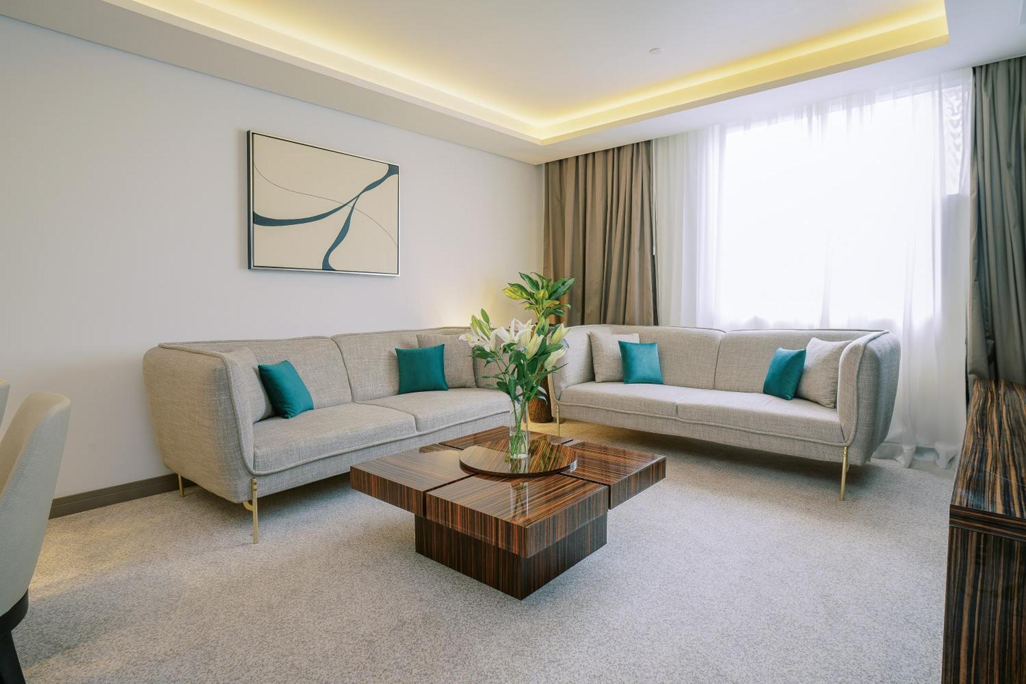 Khalidia Palace Hotel Dubai By Mourouj Gloria Екстериор снимка A living room
