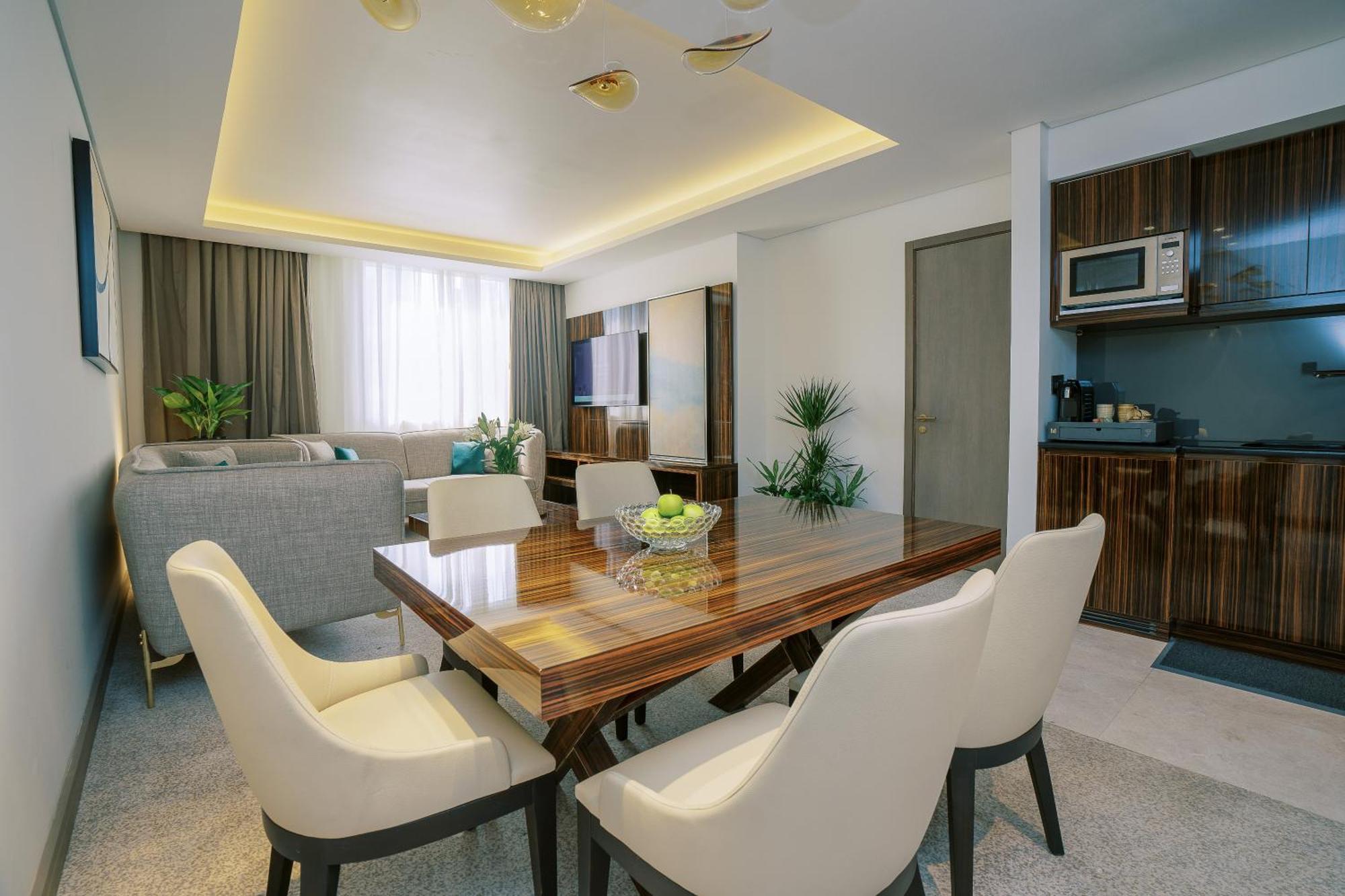 Khalidia Palace Hotel Dubai By Mourouj Gloria Екстериор снимка A 3D interior rendering of a living room