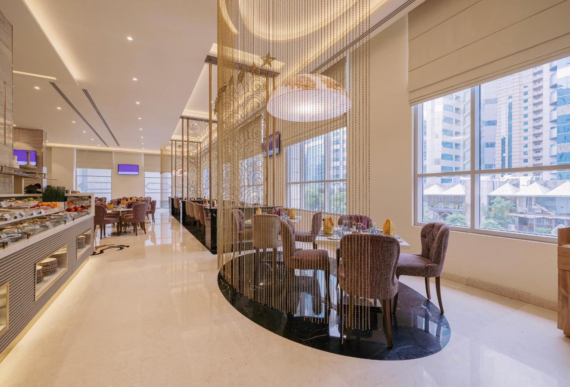 Khalidia Palace Hotel Dubai By Mourouj Gloria Екстериор снимка The restaurant